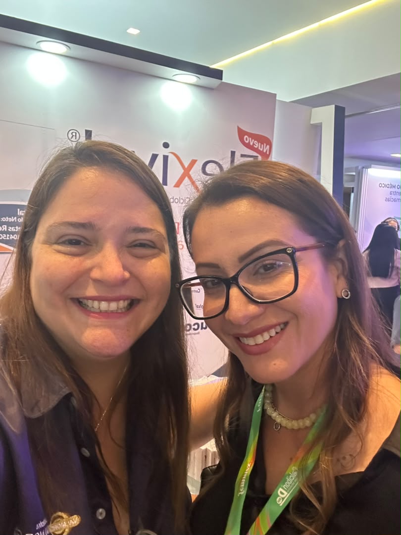 Stand de Valmorca en el XII Simposio de Reumatología: Selfie con especialista en el stand de Valmorca